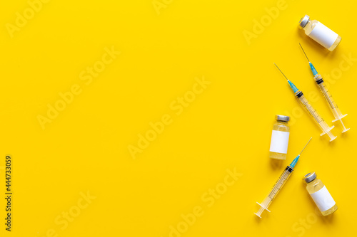 Inject the vaccine. Coronavirus vaccine ampoules with syringe