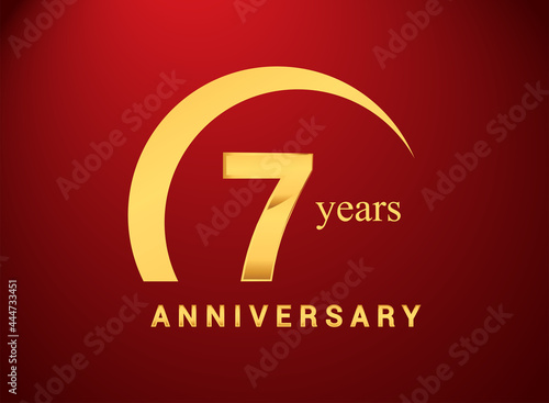 7th years golden anniversary logo with golden ring isolated on red background, can be use for birthday and anniversary celebration.