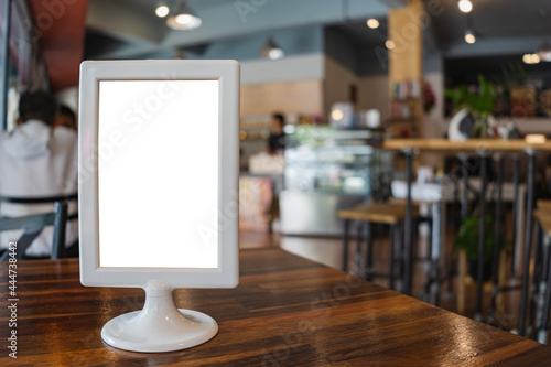 Wallpaper Mural Blank menu frame put on wooden table in cafe or restaurant. Torontodigital.ca