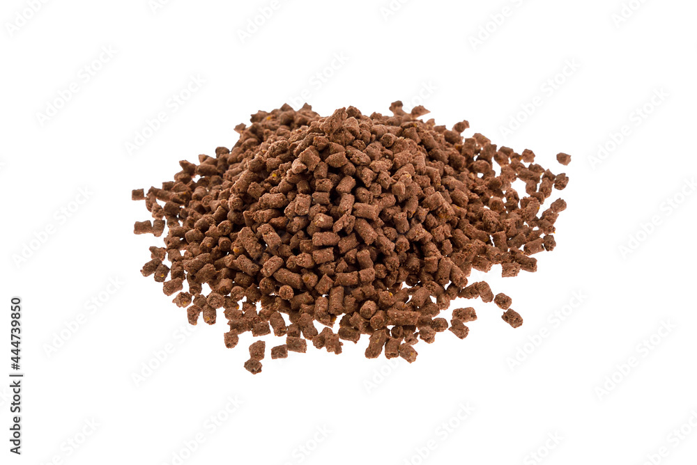 Brown Food for fishing isolated on a white background. Pile of granules to feed carp. Granule fish food. Food for fish isolated on white. Brown Food for fishing isolated on a white background. Pile of granules to feed carp. Granule fish food. Food for fish isolated on white.