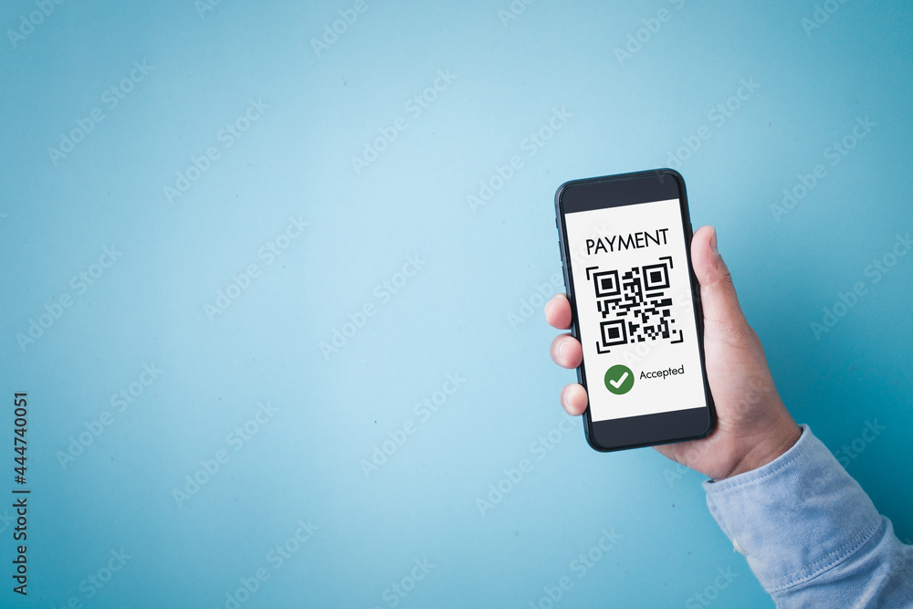Hand holding smartphone sceen with application online payment, moblie phone business shopping online and blue background. Hand holding smartphone sceen with application online payment, moblie phone business shopping online and blue background.