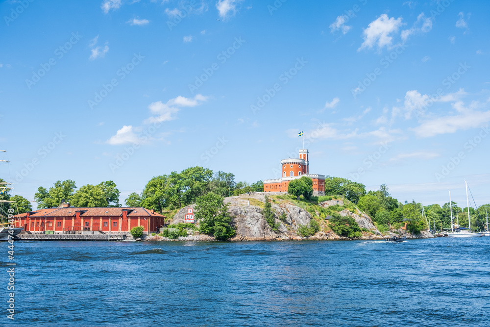 Obraz premium Views of Stockholm from the ferry to Djurgarden Island, popular attraction and tourist destination in Stockholm, Sweden. Beautiful sunny day.