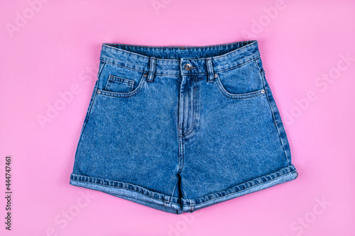 Sport inspired flatlay with blue denim shorts