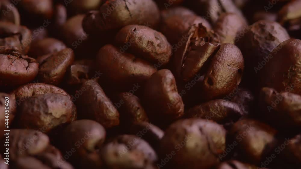 Close up of seeds of coffee with smoke from fragrant roasted coffee beans. Close up of seeds of coffee with smoke from fragrant roasted coffee beans.
