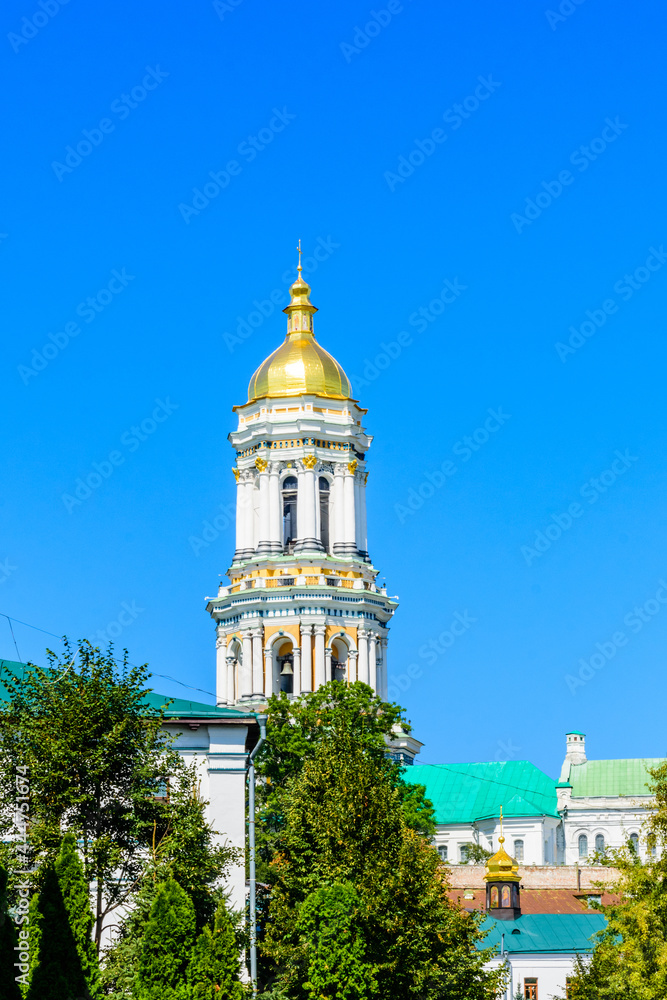 Bell tower of the Kiev Pechersk Lavra against blue sky