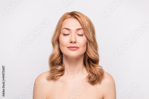 Photo portrait woman blonde hair naked shoulders enjoying skin treatment isolated white color background