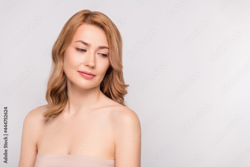 Portrait of attractive gentle woman with pure silky skin copy empty blank place space isolated over grey pastel color background