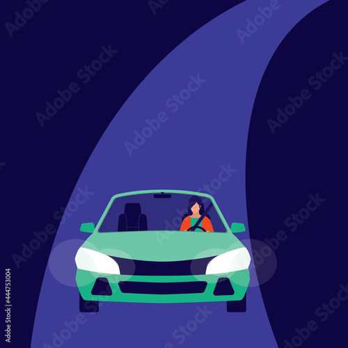 Young Woman With Seat Belt Driving Car Alone On A Quiet Road At Night.
