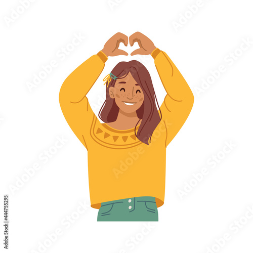 Girl kid showing heart sign with hands, isolated female personage preteen smiling and gesturing. Love and devotion, support and charity symbol of caring and empathy. Flat style cartoon character