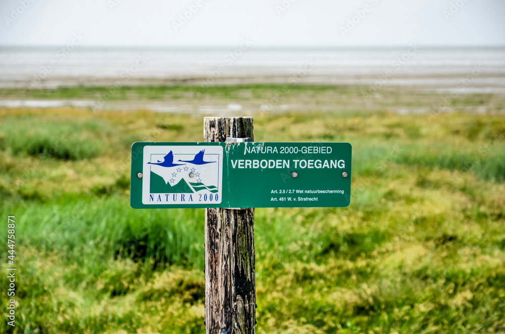 Oostvoorne, The Netherlands, June 17, 2021: No entry sign at the edge of the Voordelta Nature2000 nature reserve