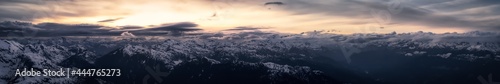 Aerial Panoramic View from Airplane of Canadian Mountain Landscape in Spring time. Colorful Sunset. North of Vancouver, British Columbia, Canada. Nature Panorama, Dark Moody Art Render © edb3_16