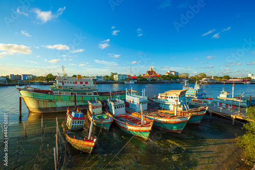 Many boats moored in sunrise morning time at Chalong port, Main port for travel ship to krabi and phi phi island, Phuket, Thailand © banjongseal324
