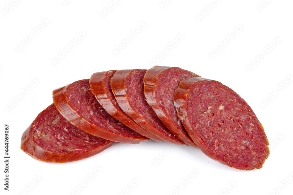 Slices of horse sausage isolated on white background.