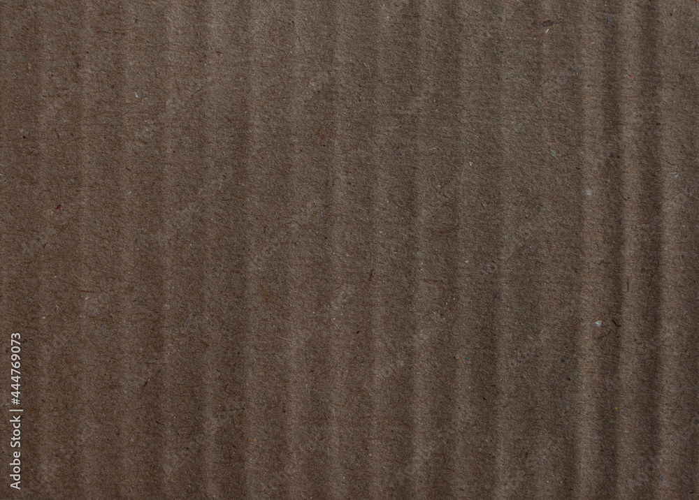 Fototapeta premium Brown cardboard sheet abstract background Texture of Folded Cardboard, Top View Carton Texture Corrugated Cardboard Texture