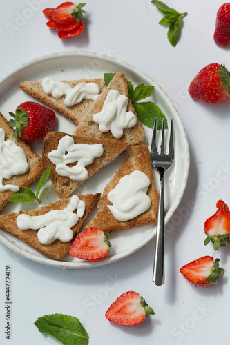 Healthy food breakfast strawberry toast with butter cream