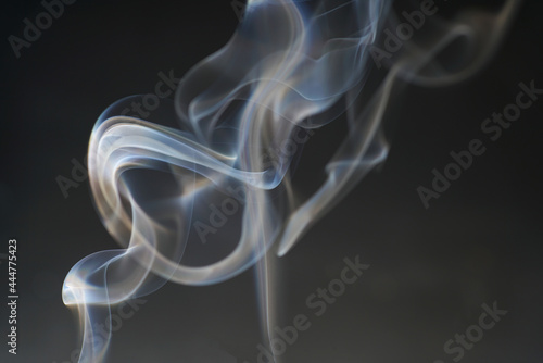 Smoke with Background structure and color foils Photographed in the studio