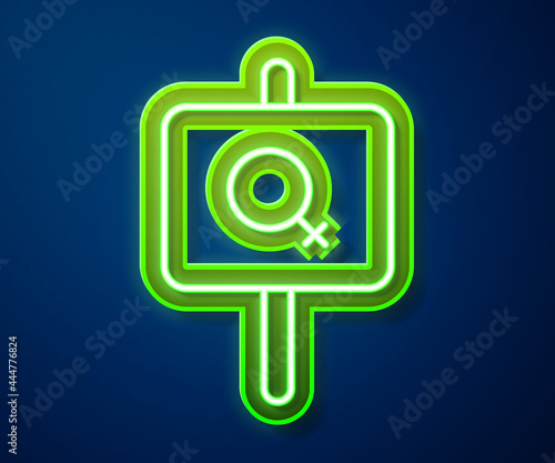 Glowing neon line Female movement, feminist activist with banner and placards icon isolated on blue background. Feminist rights movement, feminism sisterhood. Vector