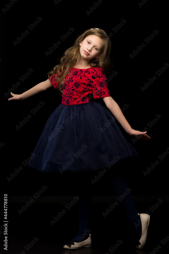 Blonde Girl Standing Standing on One Leg and Looking to the Side. Blonde Girl Standing Standing on One Leg and Looking to the Side.