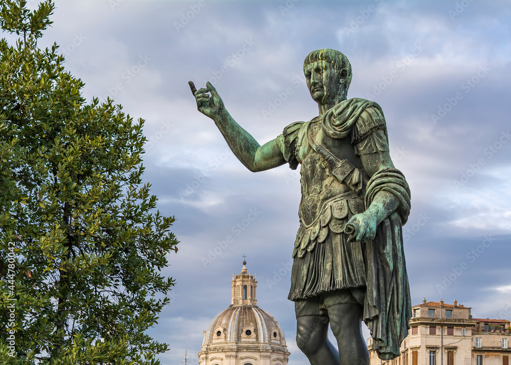 Statue of Imp Caesari Nervae with The Church of the Most Holy Name of Mary in background, Rome, Italy
