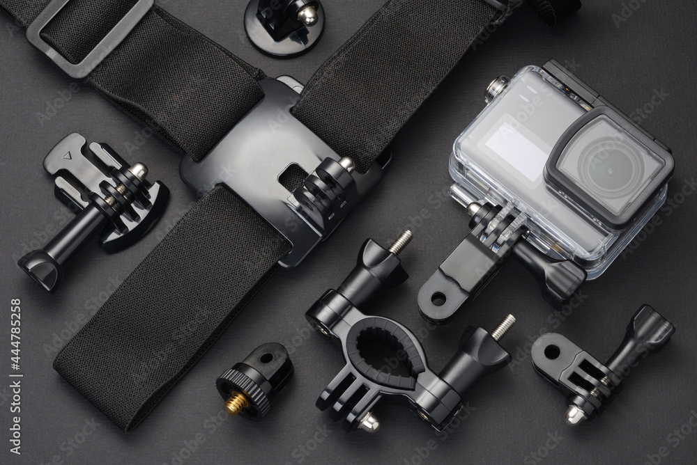 Action camera in waterproof housing and accessories Action camera in waterproof housing and accessories