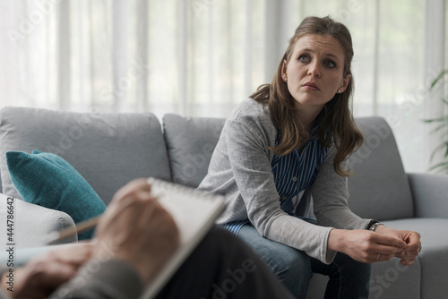 Depressed woman meeting the therapist in his office Free Download Depressed woman meeting the therapist in his office - GFXLoad