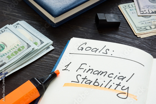 Canvas Print Written goals financial stability on the notepad page.