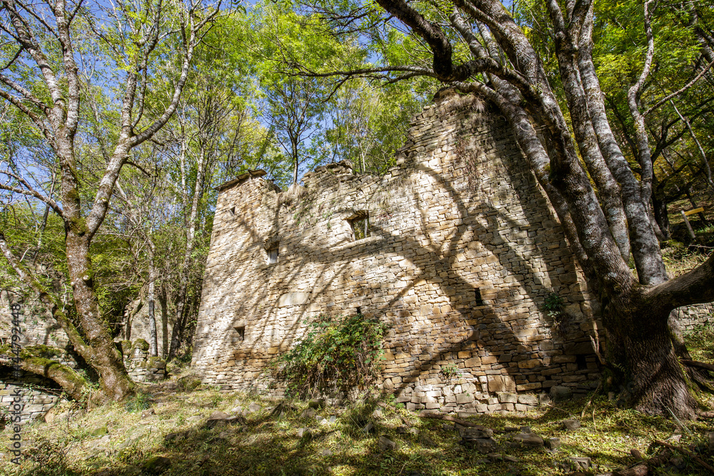 Old house in autumn forest in Ordesa and Monte Perdido National Park, Spain Old house in autumn forest in Ordesa and Monte Perdido National Park, Spain