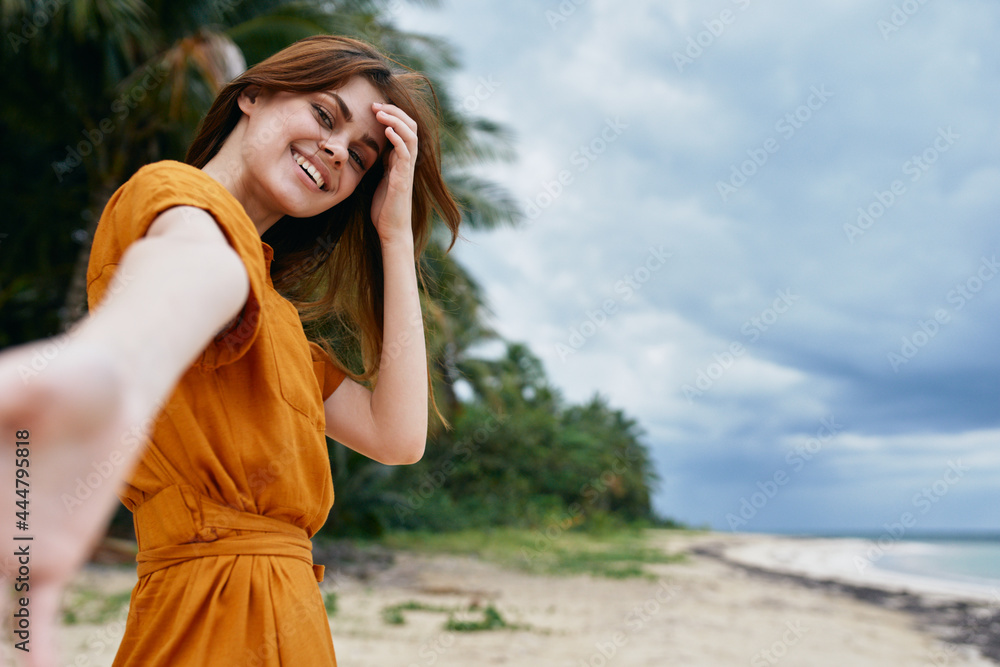 woman on the island beach landscape travel freedom fun woman on the island beach landscape travel freedom fun