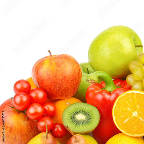 Fruits and vegetables on a platter isolated on a white . There is free space for text.