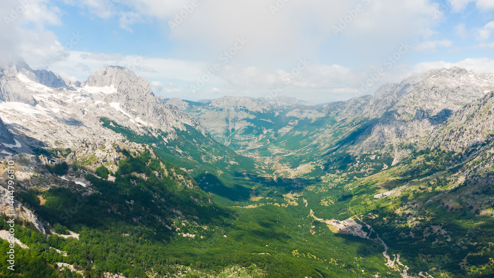 Scenic paradisiac landscape view of Albanian Alps mountains. Traveling, exploring, holiday concept Scenic paradisiac landscape view of Albanian Alps mountains. Traveling, exploring, holiday concept