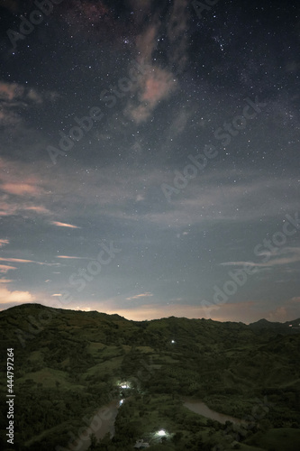 mountain scenery and a river on a starlit night © Oscar Giraldo