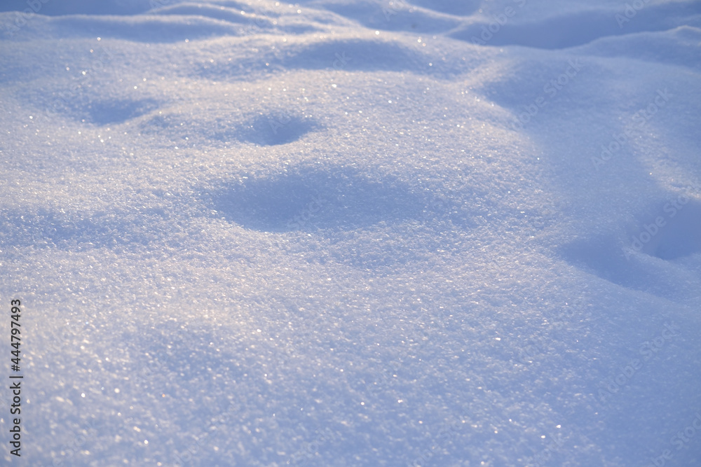 Pure white snow texture. Sparkling hills of snowflakes. Pure white snow texture. Sparkling hills of snowflakes.