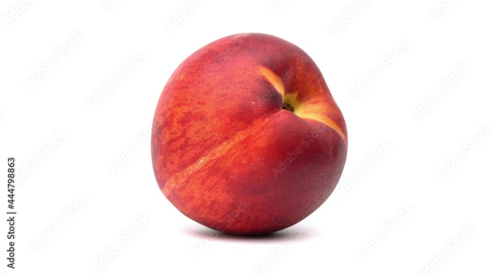 Closeup of one whole red peach rotating on white background. Closeup of one whole red peach rotating on white background.