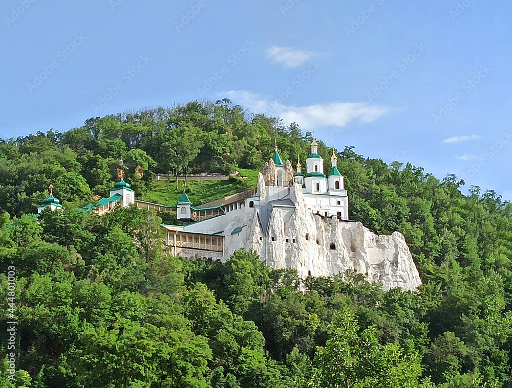 Fototapeta premium Beautiful temples of the Svyatogorsk Lavra Ukraine, Christian monks on the chalk mountains