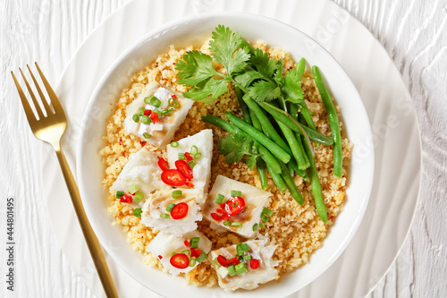 cod with bulgur, steamed green beans, top view