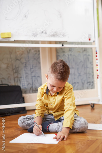 Young boy drawing