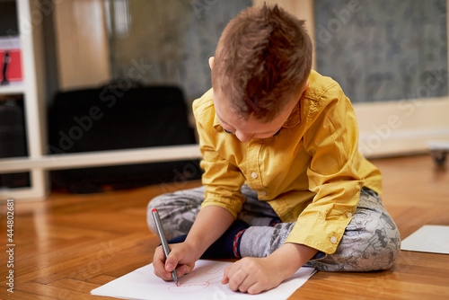 Young boy drawing