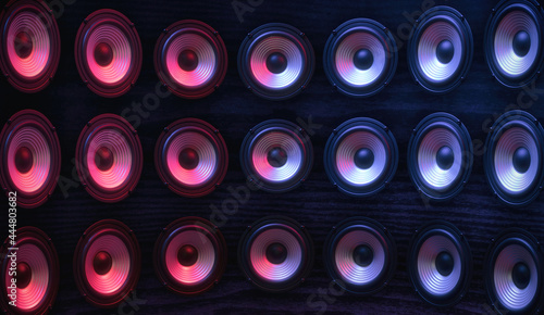 Canvastavla Group of sound speakers in neon light on black.