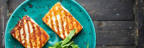 grilled cheese halloumi fried meal snack copy space food background rustic. top view keto or paleo diet photo