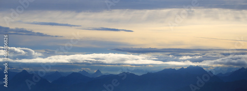 Dramatic morning sky over Mount Stanserhorn and other mountains of the Swiss Alps.