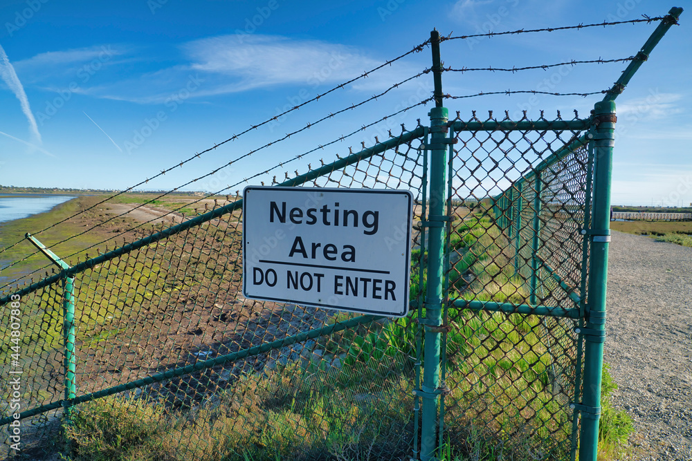 Fototapeta premium Nesting Area Do Not Enter sign at Bolsa Chica Ecological Reserve California