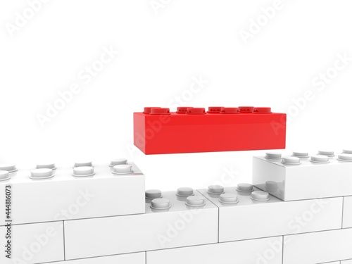 Red toy brick as the missing link between the white toy brick wall