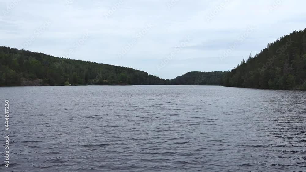 Haverud, Sweden A canal boat passes through a lock on the Dalsland Canal.