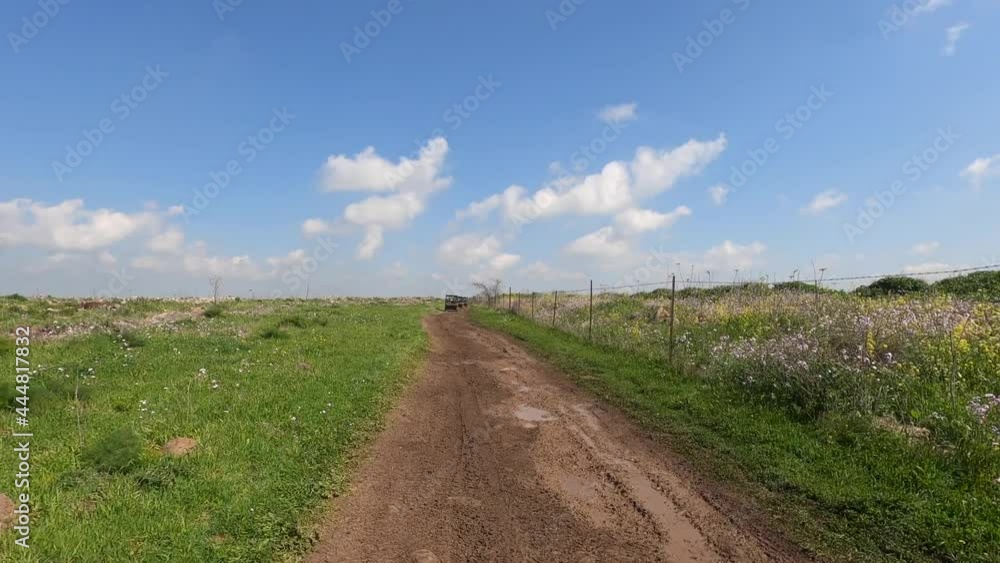 Driving nature road, landscape and scenic environment. Driver Point of view. Riding sports utility vehicle UTV side by side 4x4 4 wheel drive ATV. Driving nature road, landscape and scenic environment. Driver Point of view. Riding sports utility vehicle UTV side by side 4x4 4 wheel drive ATV.