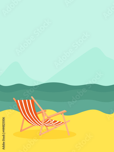A chaise longue on the beach, against the background of the sea.