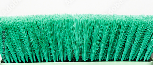 green bristle outdoor brush close up