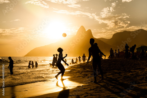 Garotos jogando Altinha, no final da tarde, em Ipanema, Rio de Janeiro, RJ, Brasil. photo