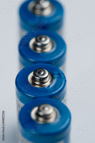 Macro photo of batteries for electronic devices on a white background. photo