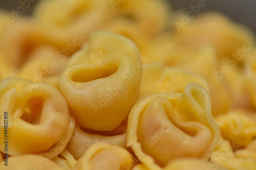 Tortellini pasta background. Natural food, farm products concept.