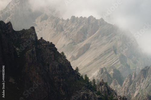 Mountain range and clouds on the path to colle delle muine (pass of muine) in maira valley, beautiful landscape in the maritime alps of Piedmont, Italy © Alessandro Cristiano